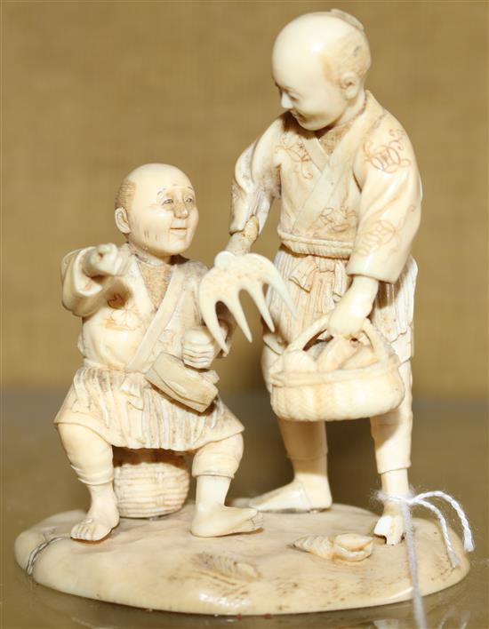 Japanese ivory group of two farmers